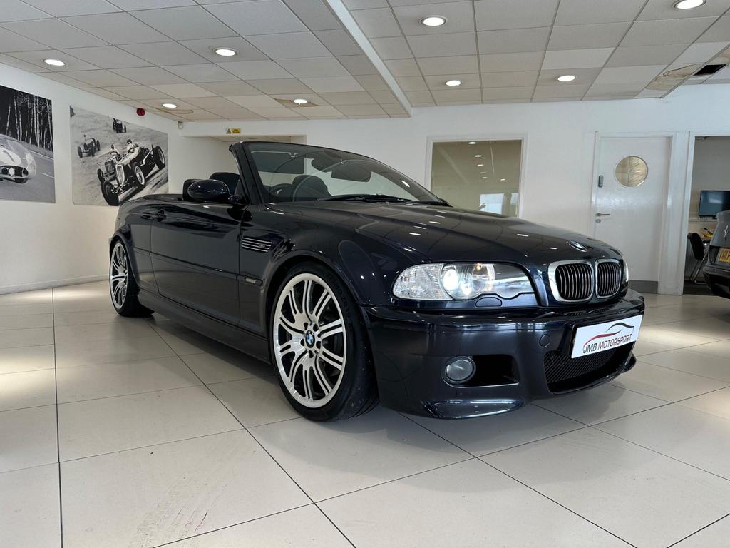 Side view of a black BMW M3 3.2i 2dr with alloy wheels and a hardtop roof.