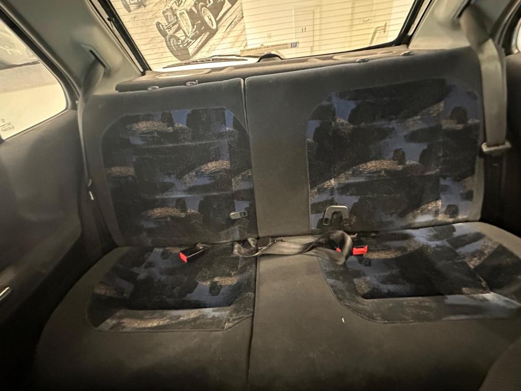 Interior of the 1998 car featuring electric tilt/slide sunroof and front electric windows.