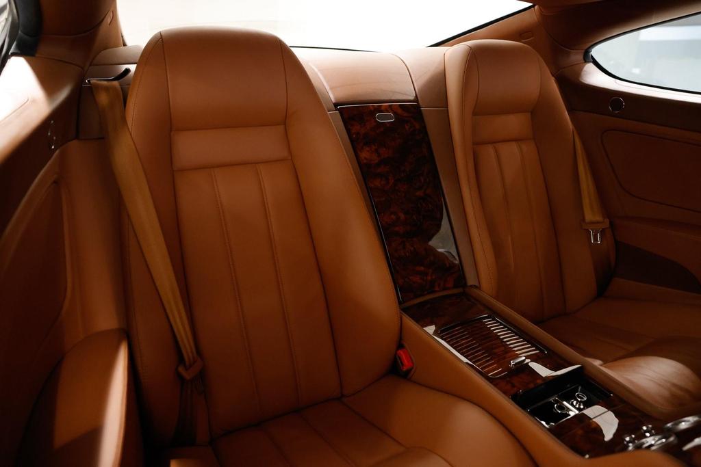 Luxurious interior of the 2005 sedan featuring leather upholstery and climate control for year-round comfort.