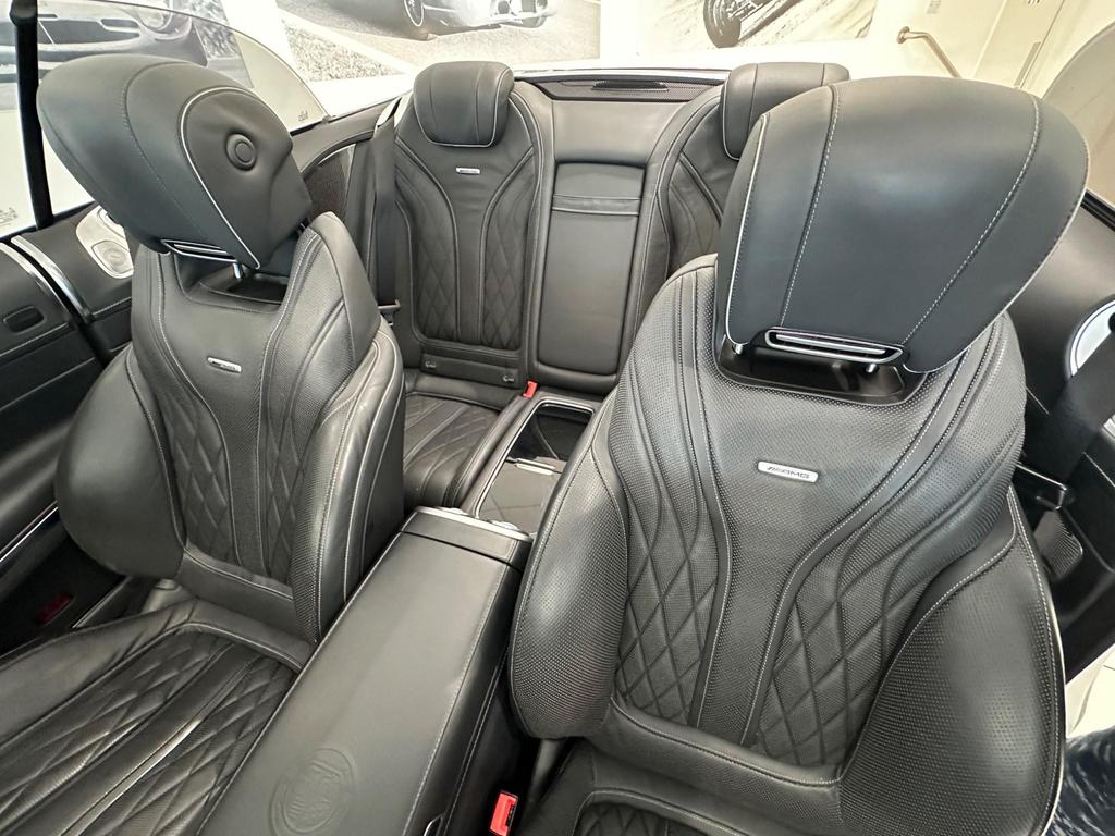 Luxurious interior of the Mercedes S63 AMG with Burmester High-End 3D Surround Sound and Nappa leather seats.