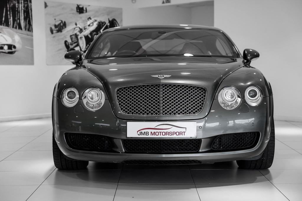 Front view of the 2005 luxury sedan in elegant green, showcasing its refined design and excellent condition.